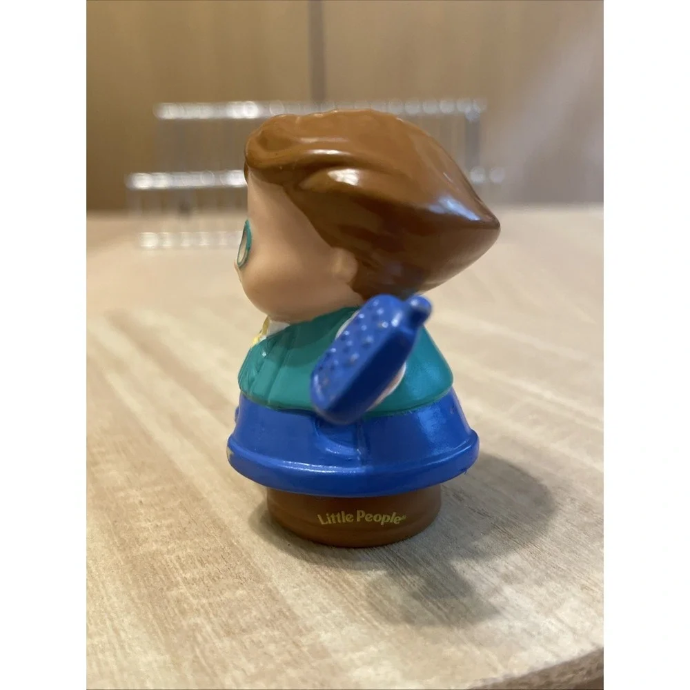 Fisher-Price Little People Dad figure from the 2001 Sweet Sounds Home play set